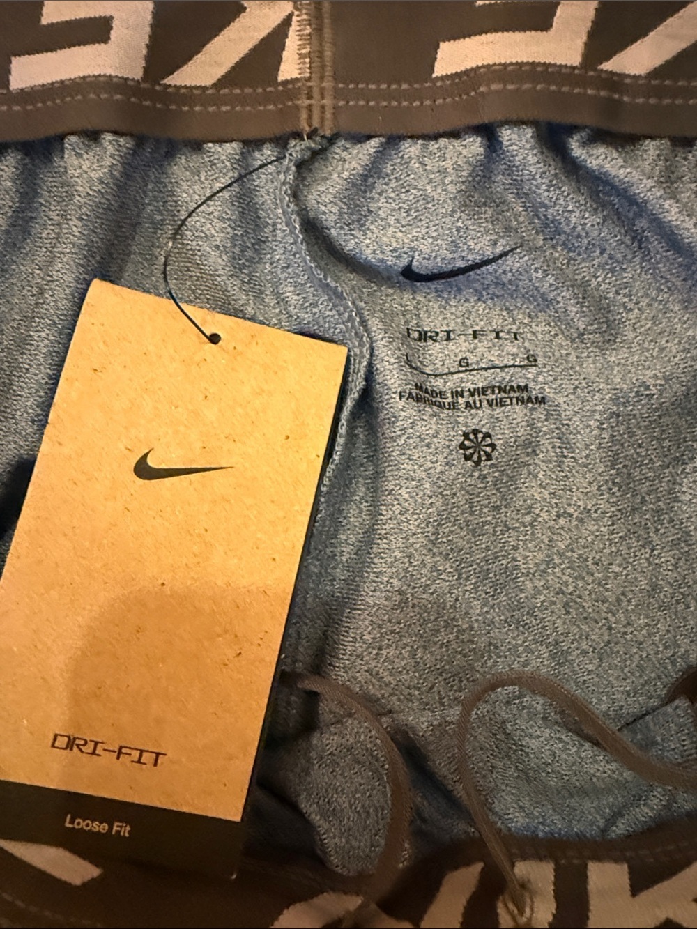 Nike Light Blue Athletic Shorts with White Swoosh - Picture 3 of 9
